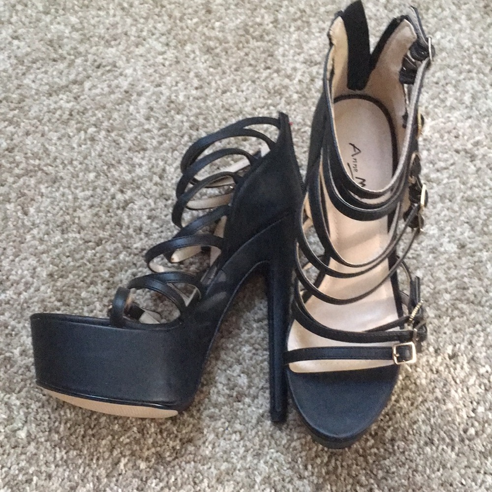 Black platform strappy stiletto heels. SEXY!